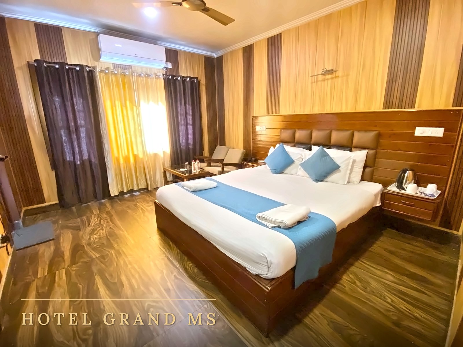 Super Deluxe Room with padded headboard