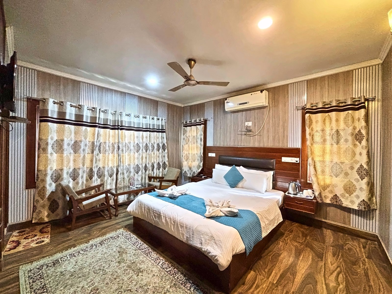 Deluxe Room with curtains and AC